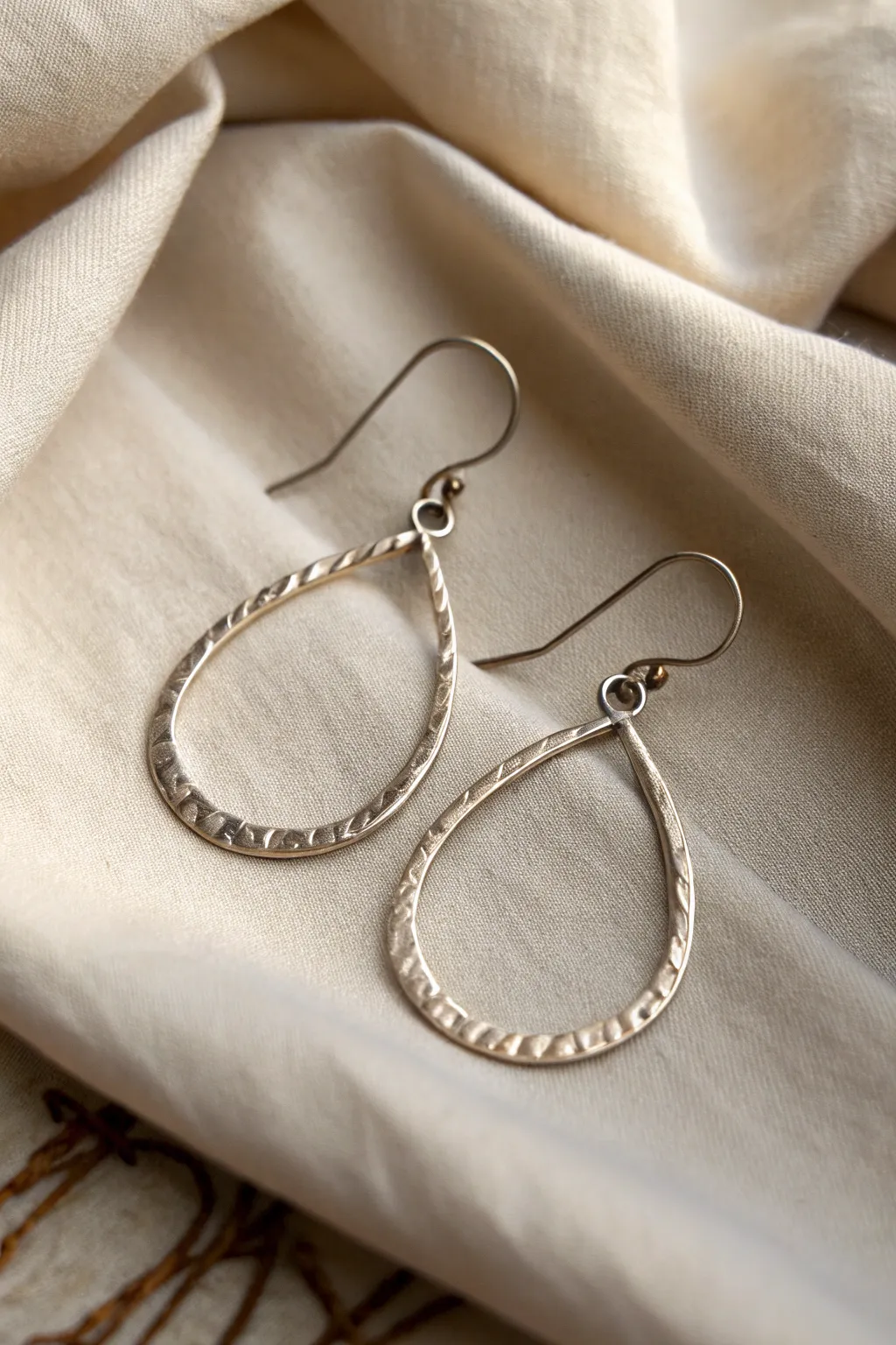 Discover the rustic charm of hammered wire earrings — where craftsmanship meets minimalist elegance.