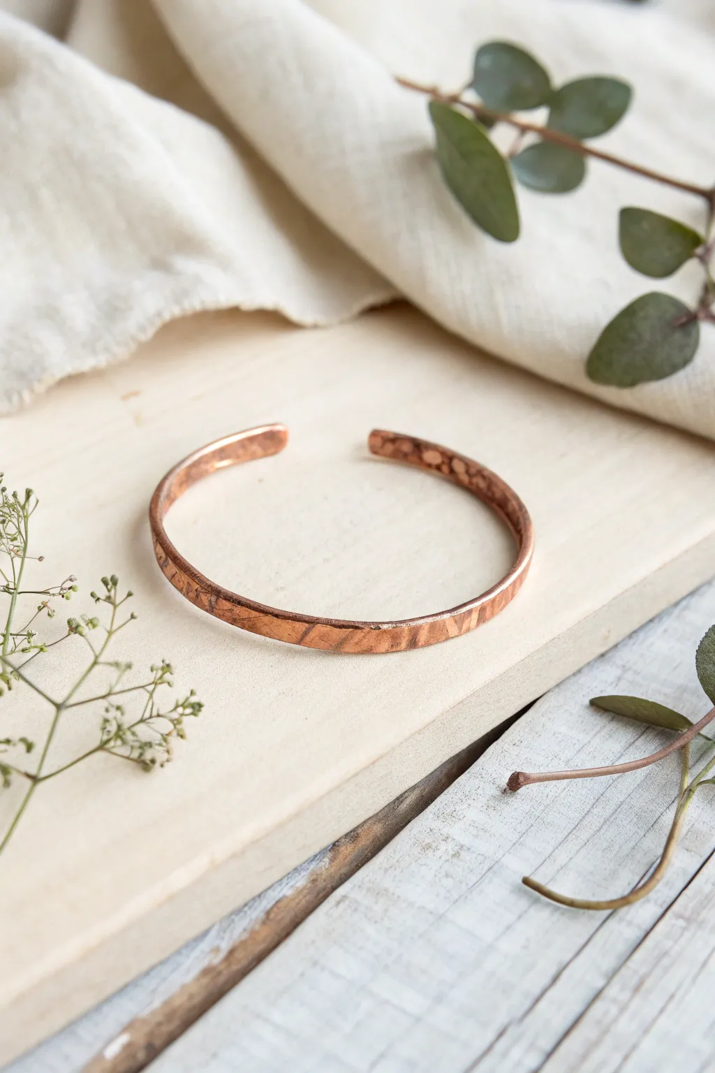 Embrace rustic elegance with this handcrafted copper cuff—where simplicity meets style.