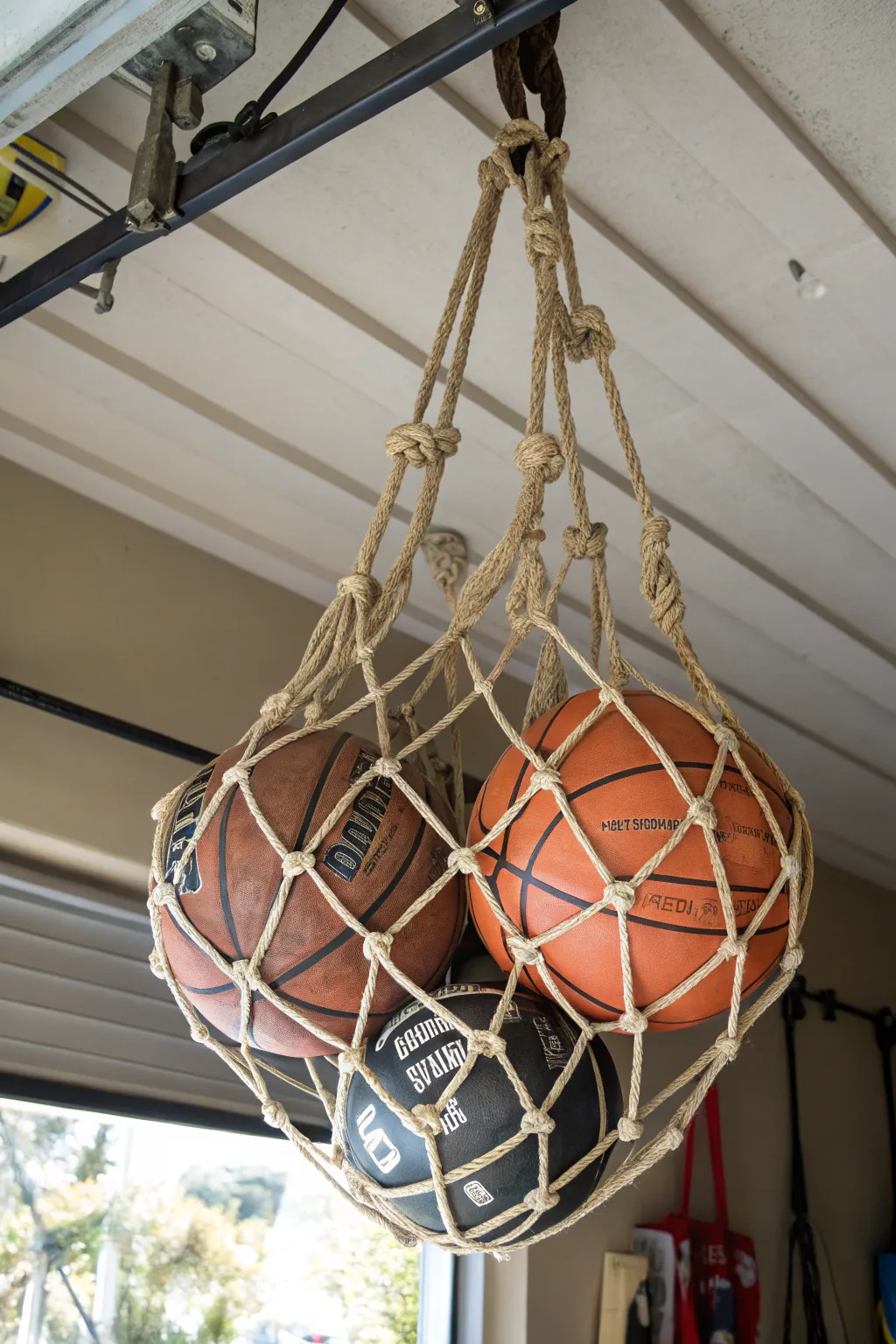 Elevate your storage game: Artisanal ceiling nets for a clutter-free garage.