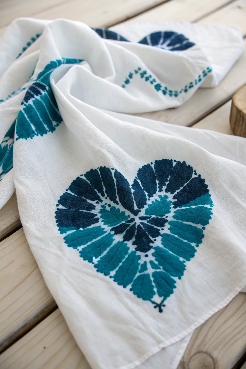 Craft your love with a heart-shaped bleach tie-dye pattern, where simplicity meets bold beauty.