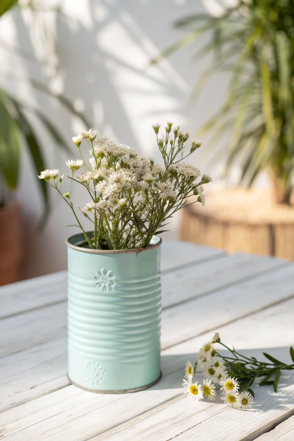 Transform the ordinary into extraordinary with this charming upcycled tin can vase, blending sustainability with minimalist beauty.