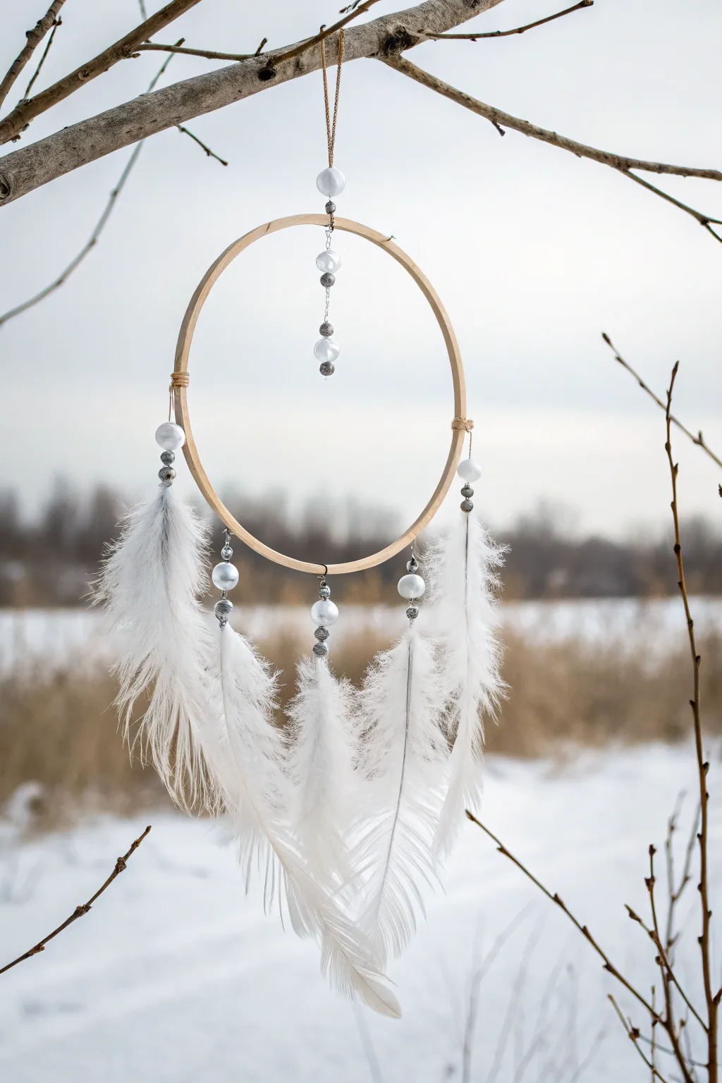 Embrace the serene beauty of winter with this snowy white hula hoop accent, a perfect blend of minimalist elegance and boho charm.