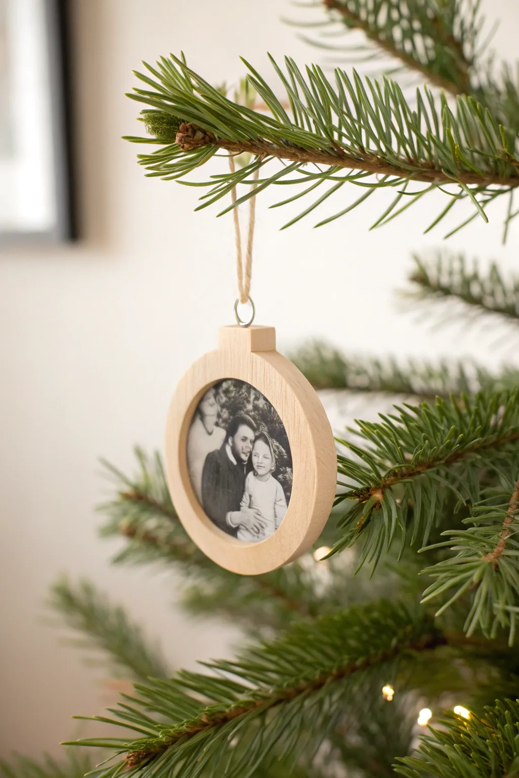 Capture and cherish timeless memories with this elegant DIY photo ornament.
