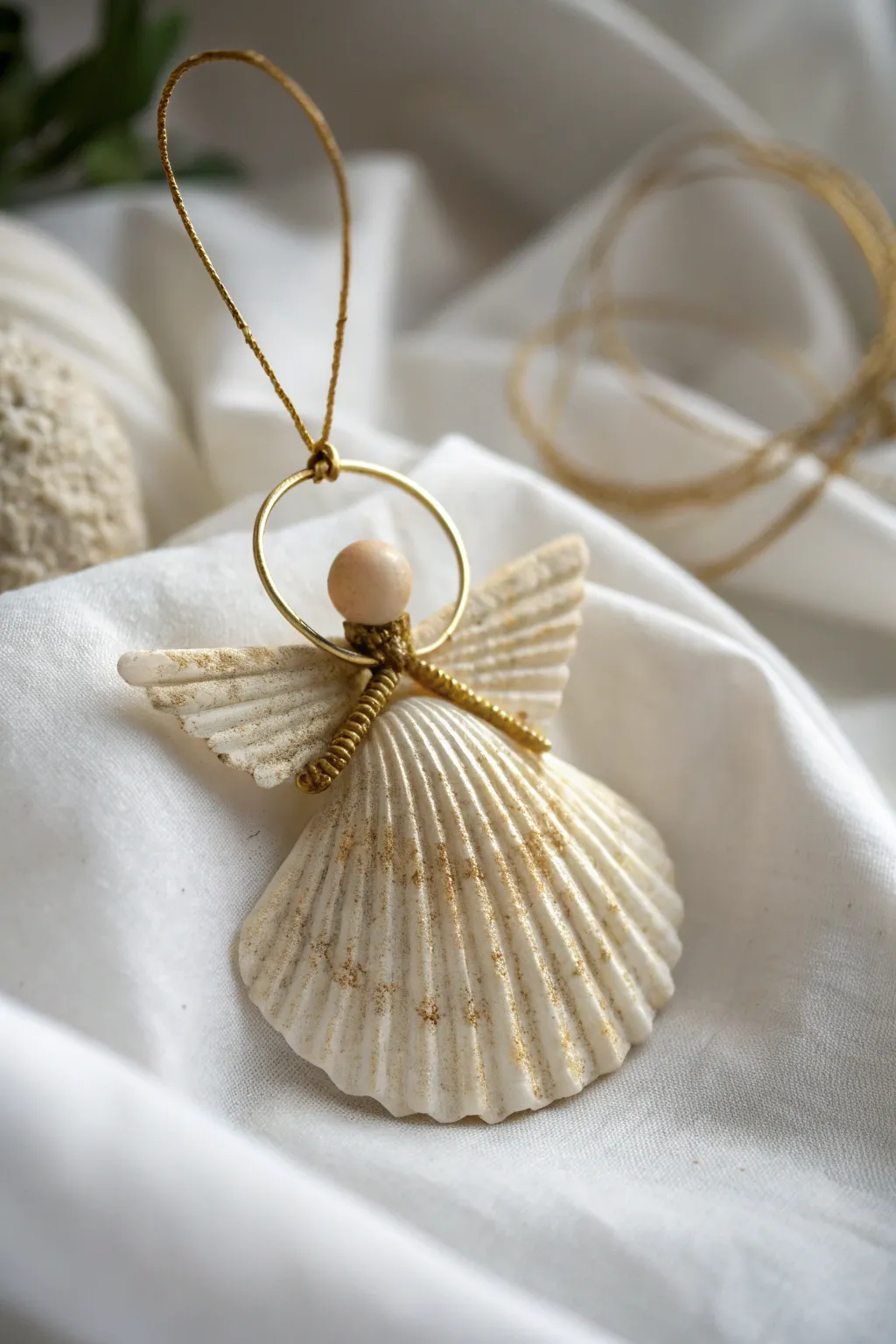 Embrace the coastal charm of winter with handcrafted seashell angels.