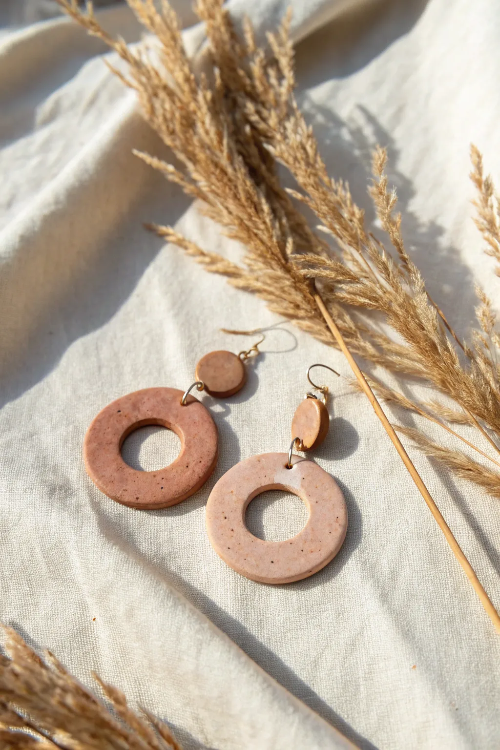 Embrace the beauty of simplicity with these minimalist clay earrings.