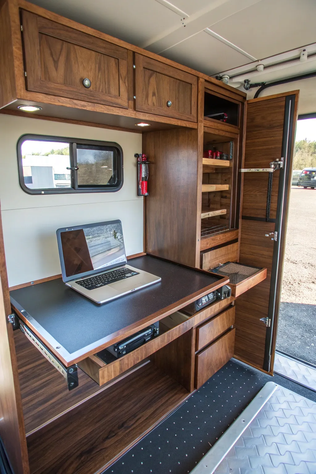 Transform your trailer into a mobile workstation with this expertly crafted fold-down desk, perfect for notes and quick tasks on the go.