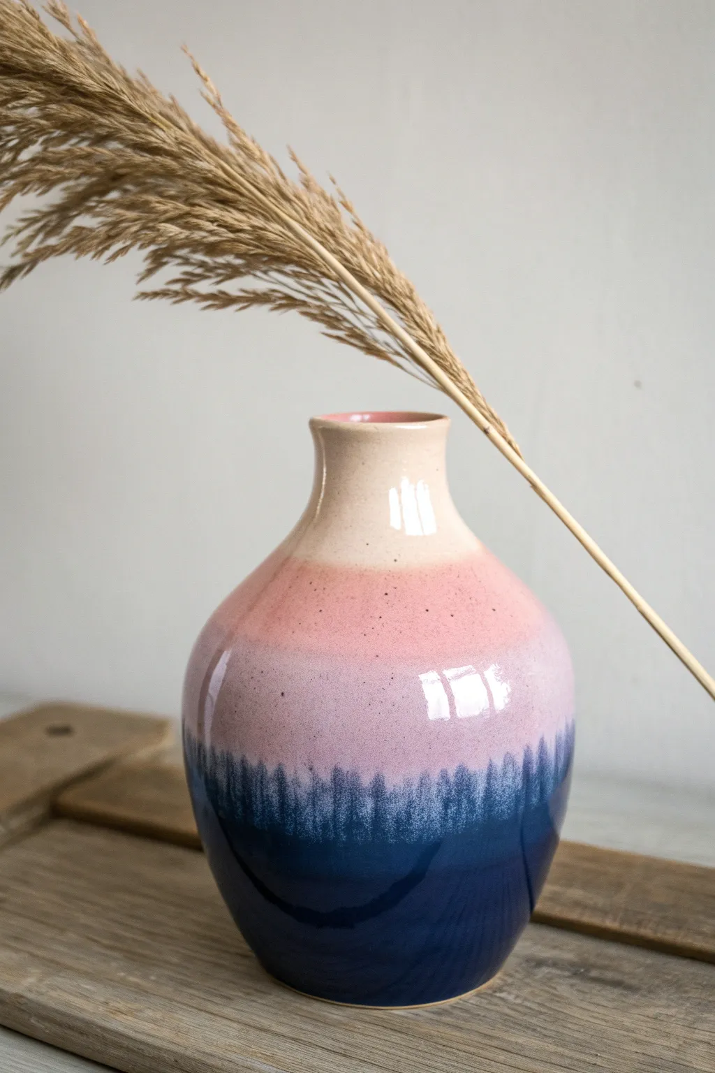 Embrace the art of spray glazing for seamless color transitions and striking elegance in ceramics.