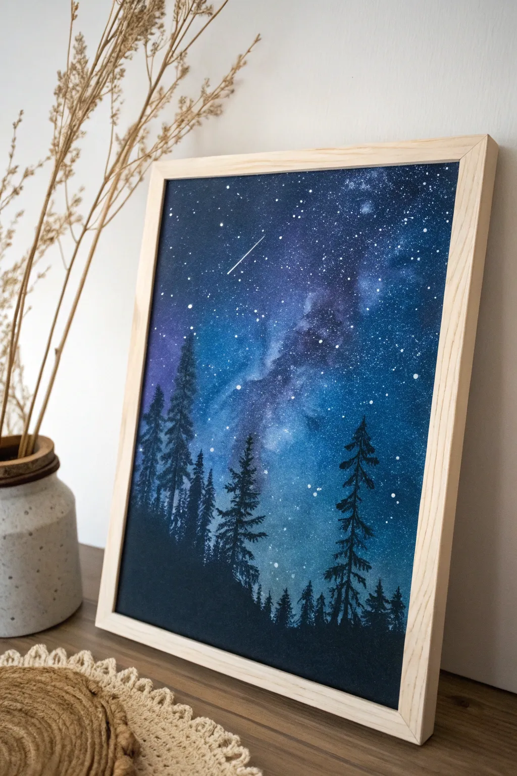 Capture the magic of a night sky with a minimalist silhouette painting that enchants with its simplicity and bold contrast.