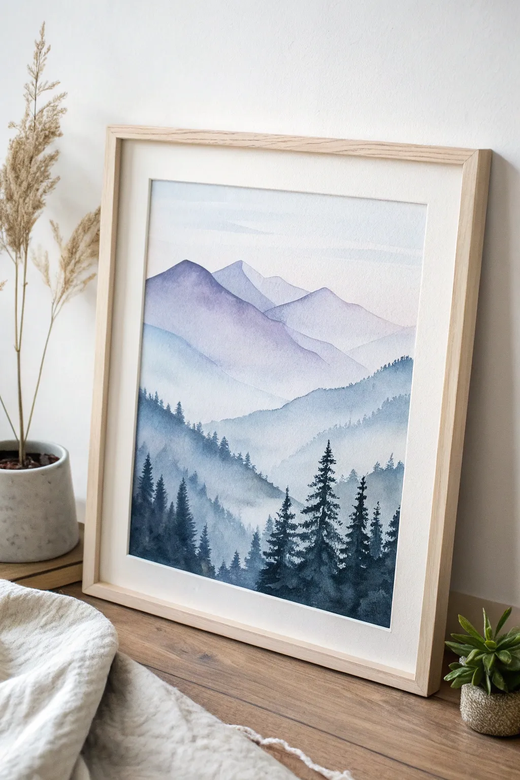 Embrace the mystical allure of gradient mountainscapes with soothing blues and purples in minimalist watercolor art.