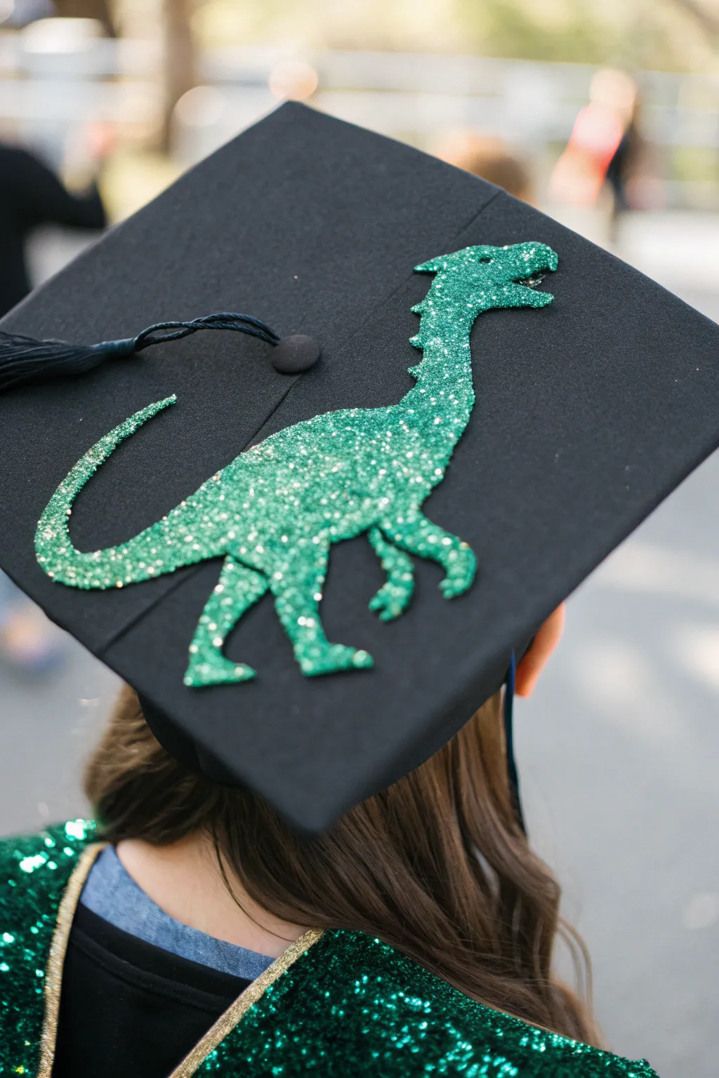 Unleash your inner dinosaur on graduation day with a touch of glittering brilliance!