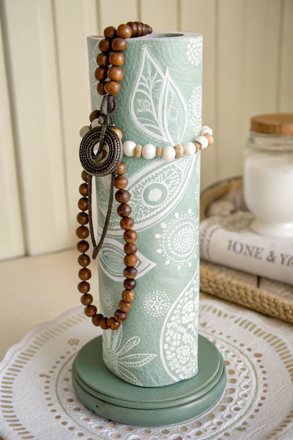 Craft your own chic bracelet display from an upcycled paper towel holder, where simplicity meets style!