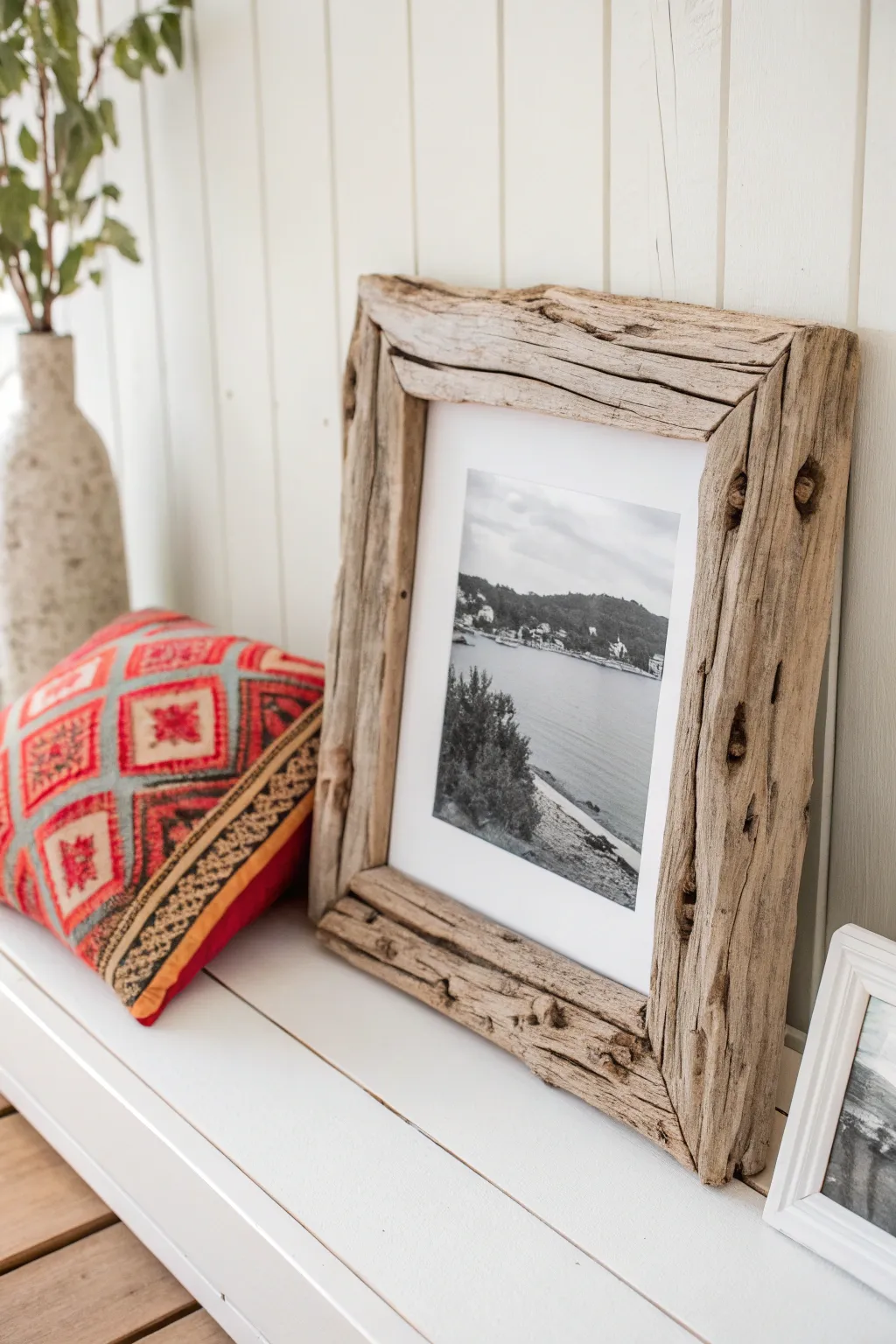 Capture lakeside memories with rustic charm using handcrafted driftwood frames.
