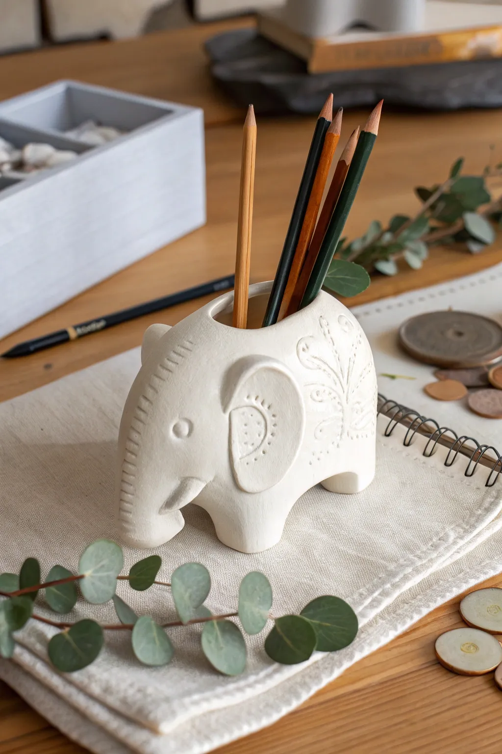 Add a whimsical touch to your workspace with this charming elephant pencil holder, perfect for those who love minimalist design with a Boho twist.
