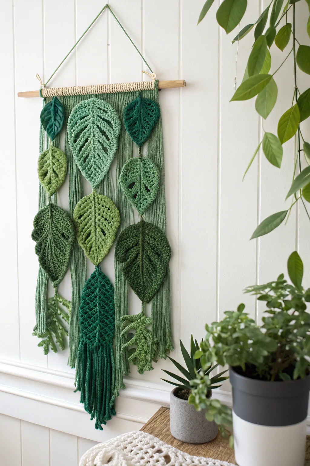 Bring a touch of nature indoors with this stunning green crochet botanical wall hanging, perfect for adding boho charm to any minimalist space.