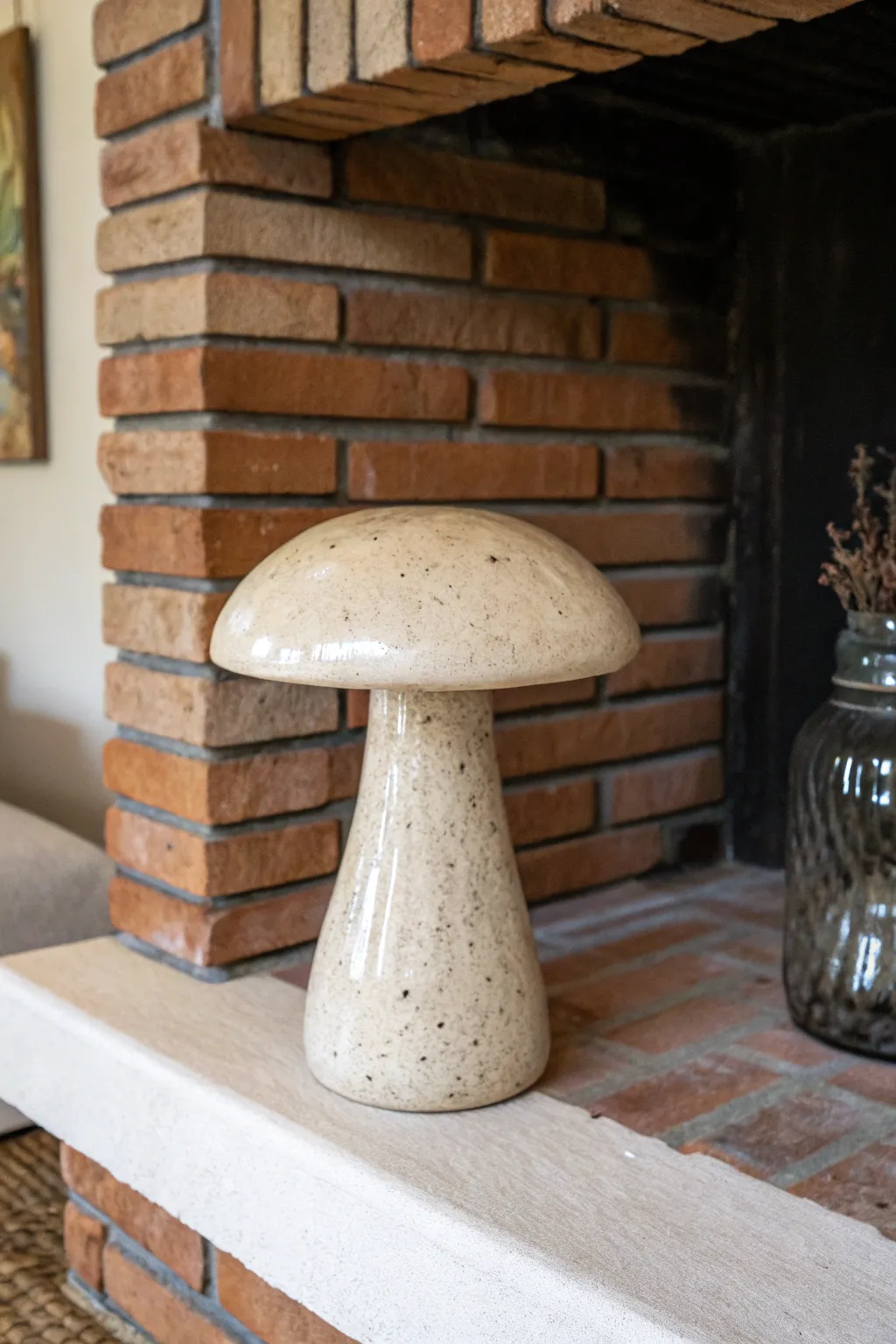 Add rustic charm to your space with this oversized ceramic mushroom, a perfect blend of simplicity and artistry.