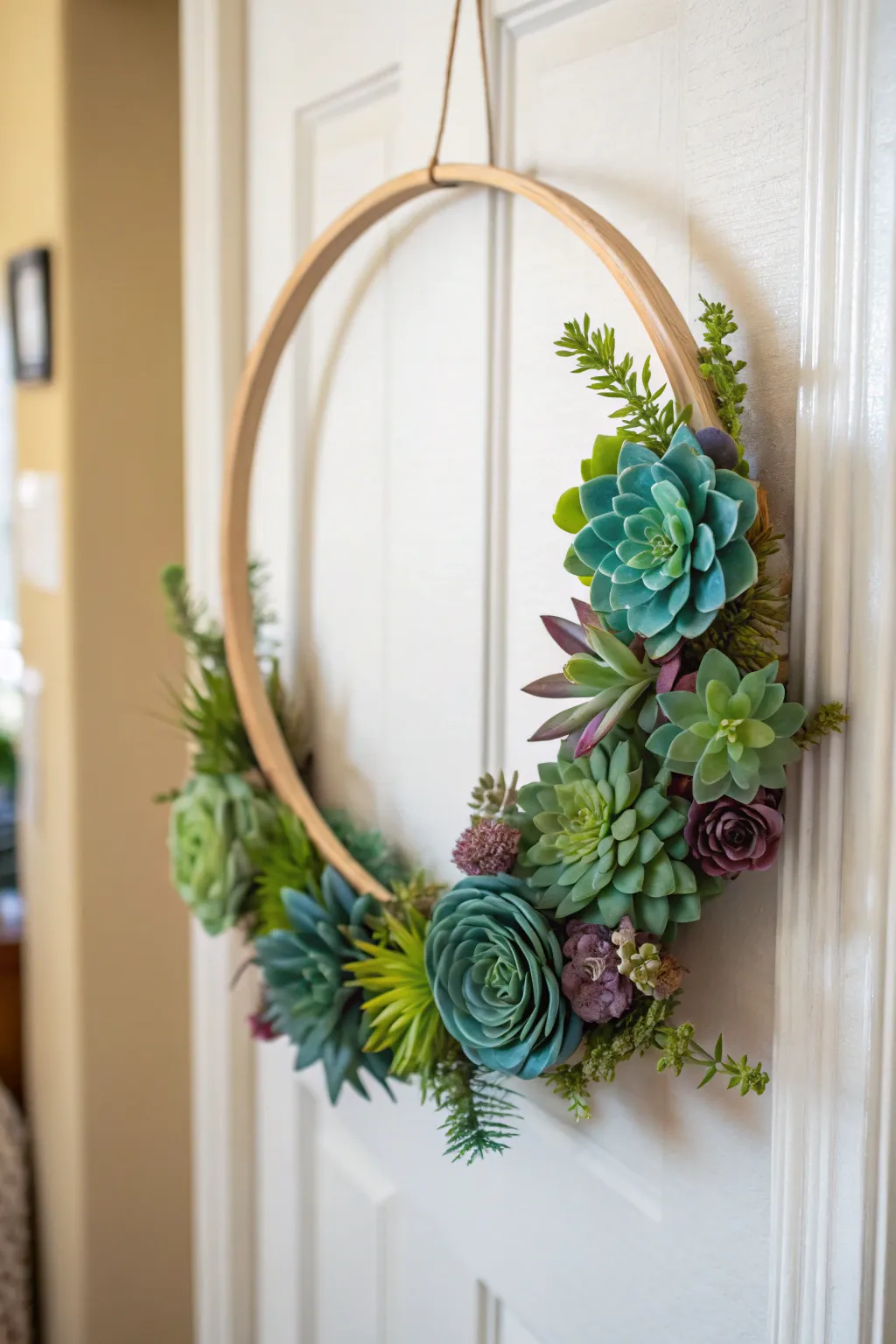 Elevate your space with a modern succulent hoop wreath—where simplicity meets natural elegance.