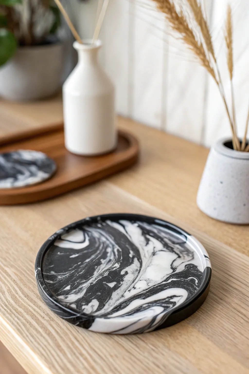 Embrace the elegance of monochrome magic with these exquisite black and white resin coasters, perfect for your minimalist sanctuary.