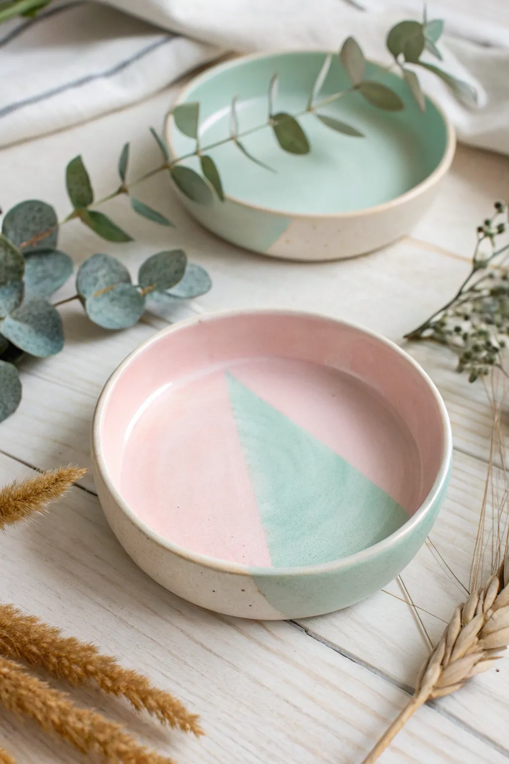 Embrace the gentle beauty of pastel perfection with this exquisite handcrafted jewelry dish.