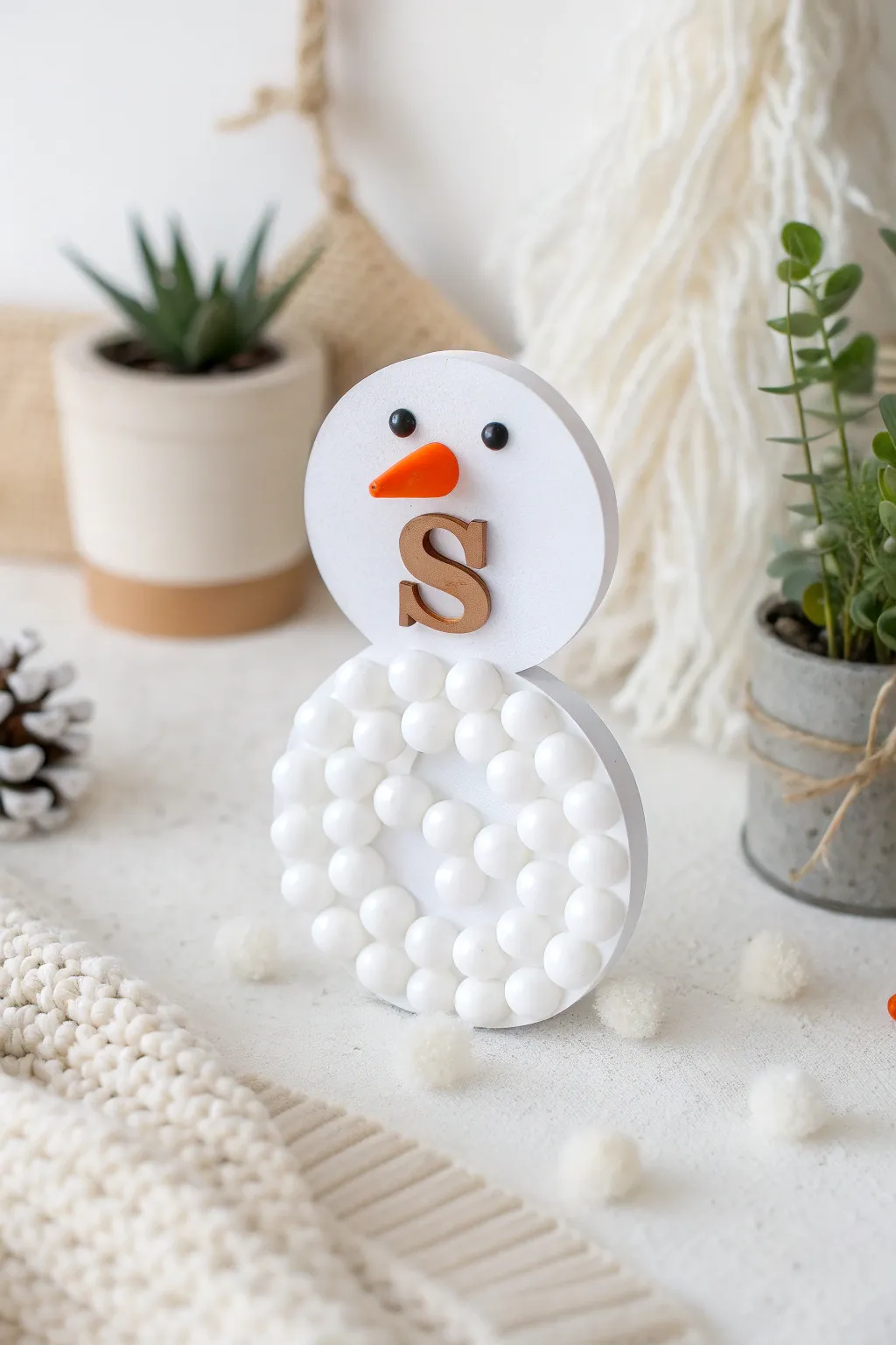 Transform the letter 'S' into your very own snowman, even in warm weather! A perfect blend of minimalism and playful creativity.