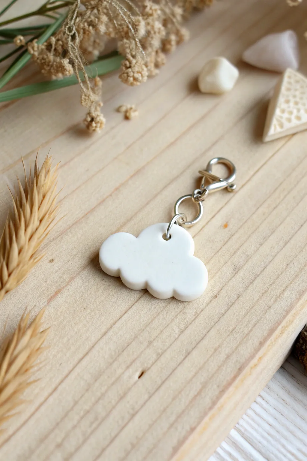 Embrace serene days with a handcrafted cloud charm, a perfect blend of simplicity and elegance.