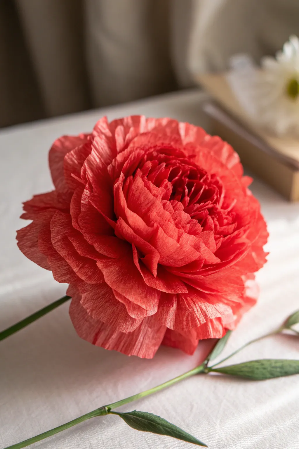 Bring a touch of everlasting beauty to your space with handcrafted red tissue paper flowers.