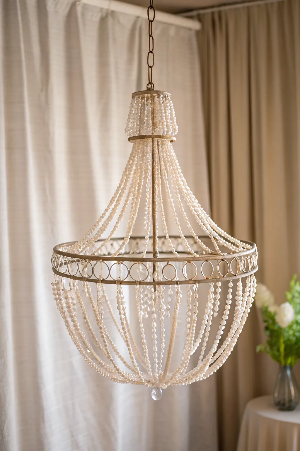 Elevate your space with this artistic sculptural chandelier, where minimalism meets boho elegance.