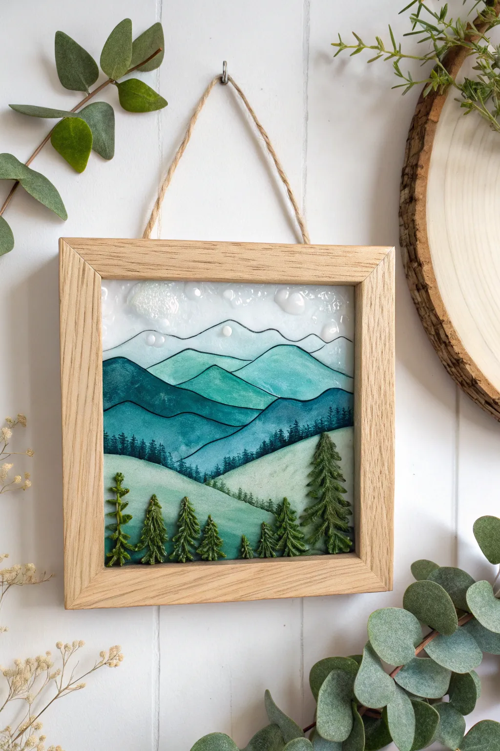 Discover serenity in miniature: A captivating resin landscape that brings the outdoors inside.