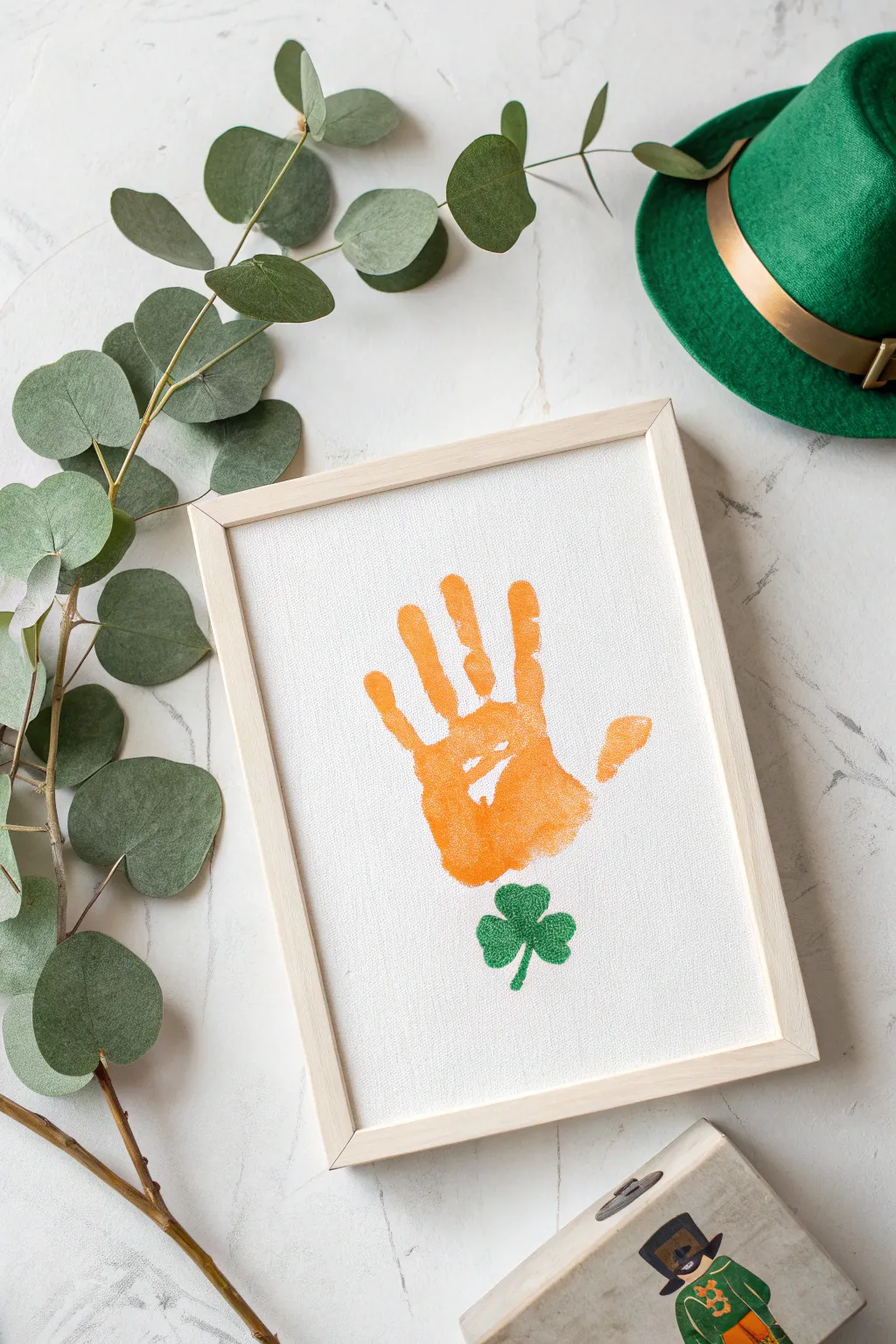 Capture the magic of St. Patrick's Day with this charming handprint leprechaun craft!