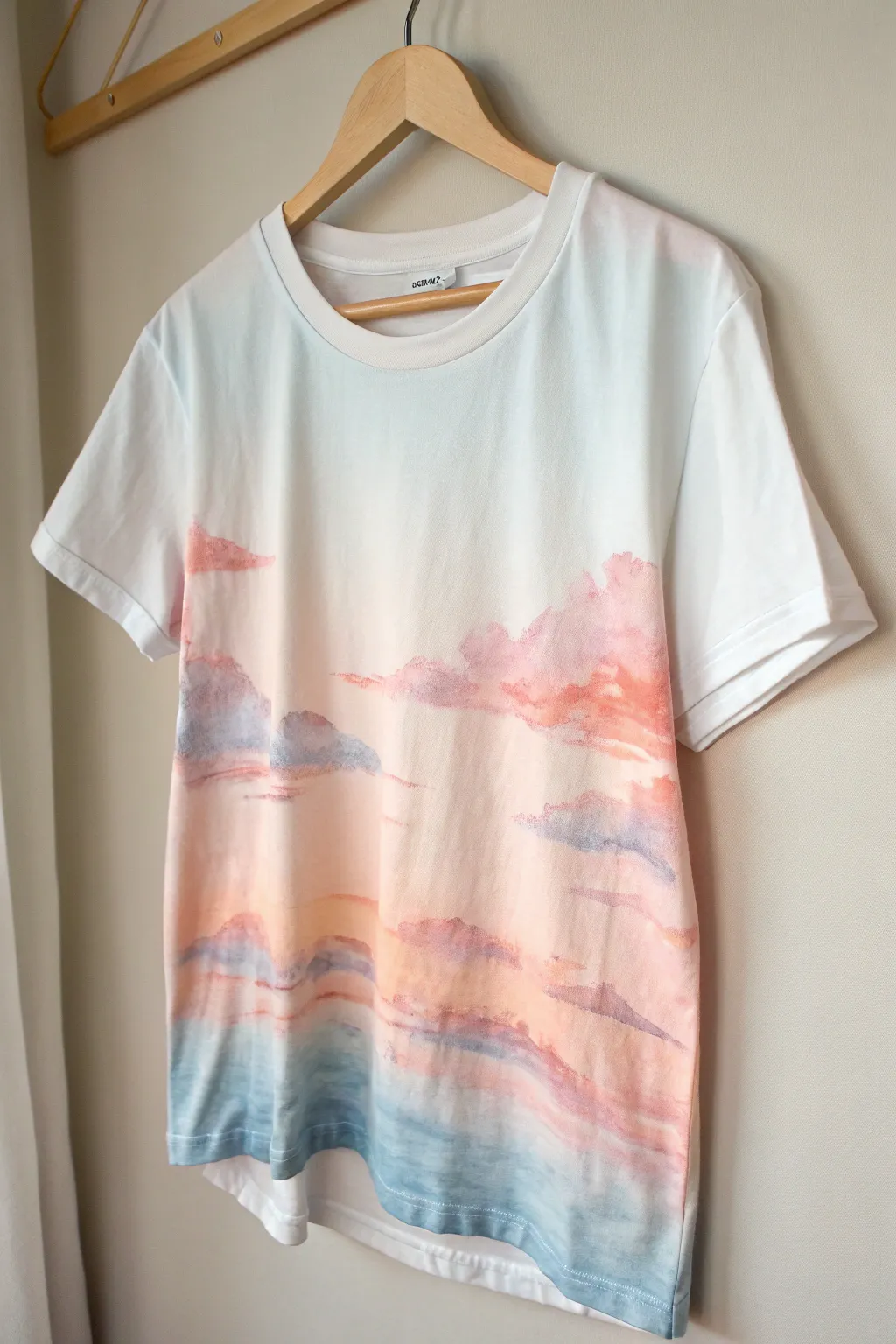 Capture the essence of a sunset with whimsical watercolor designs on your t-shirt.