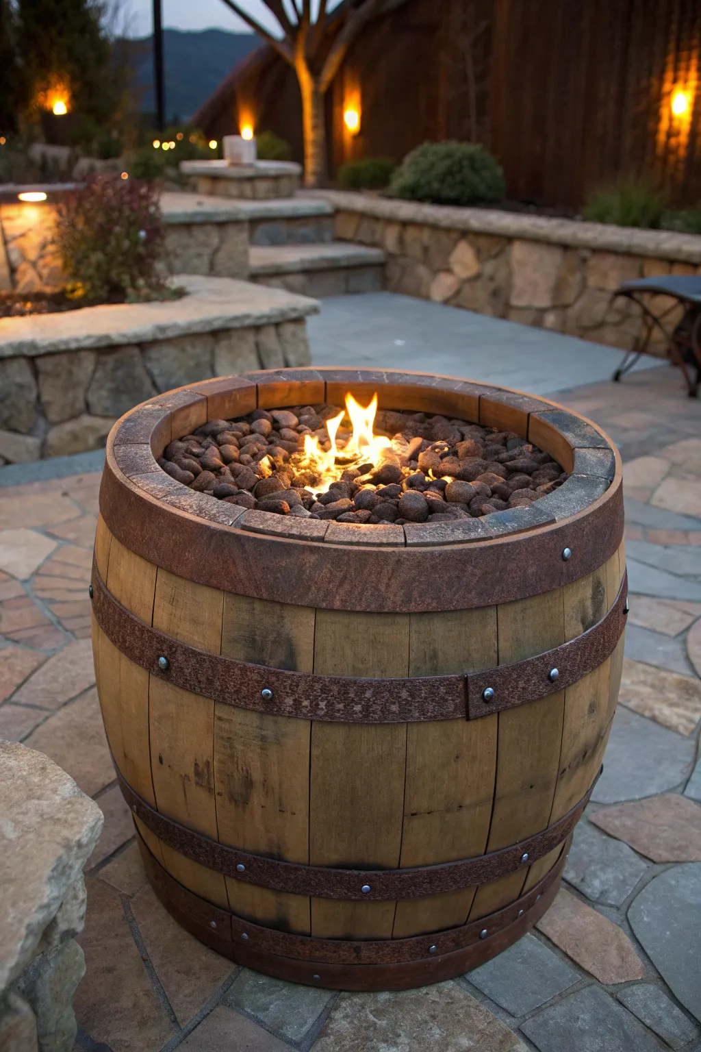Transform your fire pit into a rustic masterpiece with repurposed wine barrel rings.