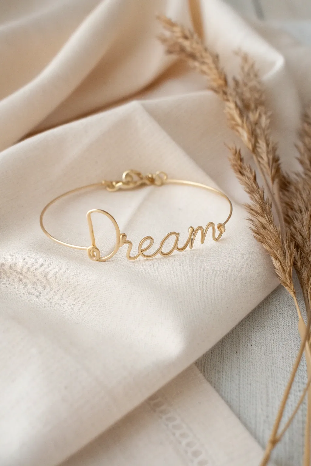 Embrace elegance with a personalized wire writing bracelet – a perfect blend of artistry and sentiment.