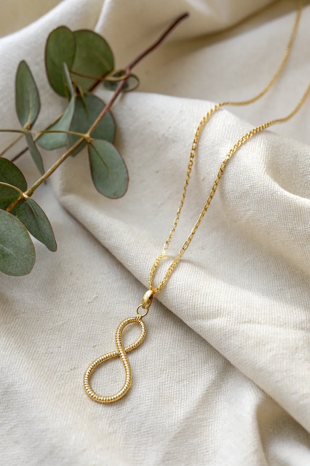 Crafted Elegance: Discover the timeless beauty of handmade infinity pendants.