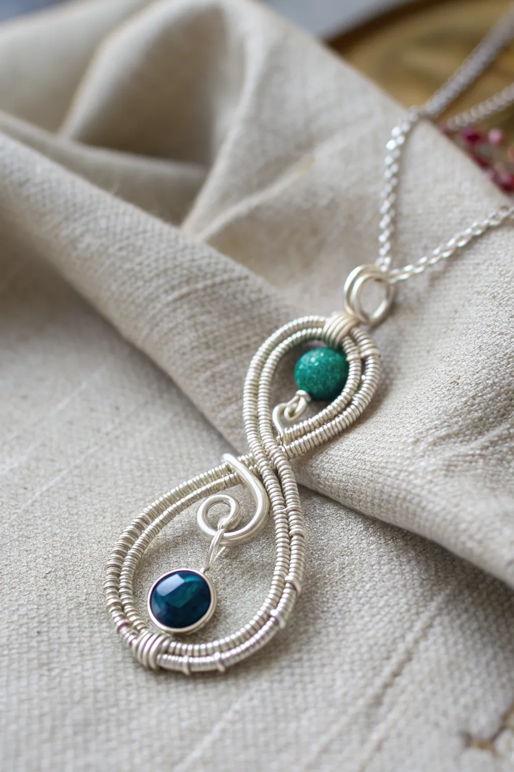 Infinity in elegance: A minimalist wire-wrapped pendant that speaks of timeless connections.