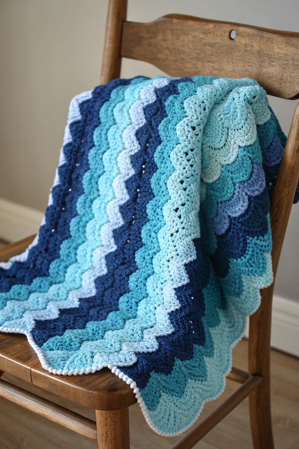 Embrace the tranquility of seaside waves with this stunning ripple pattern crochet blanket.