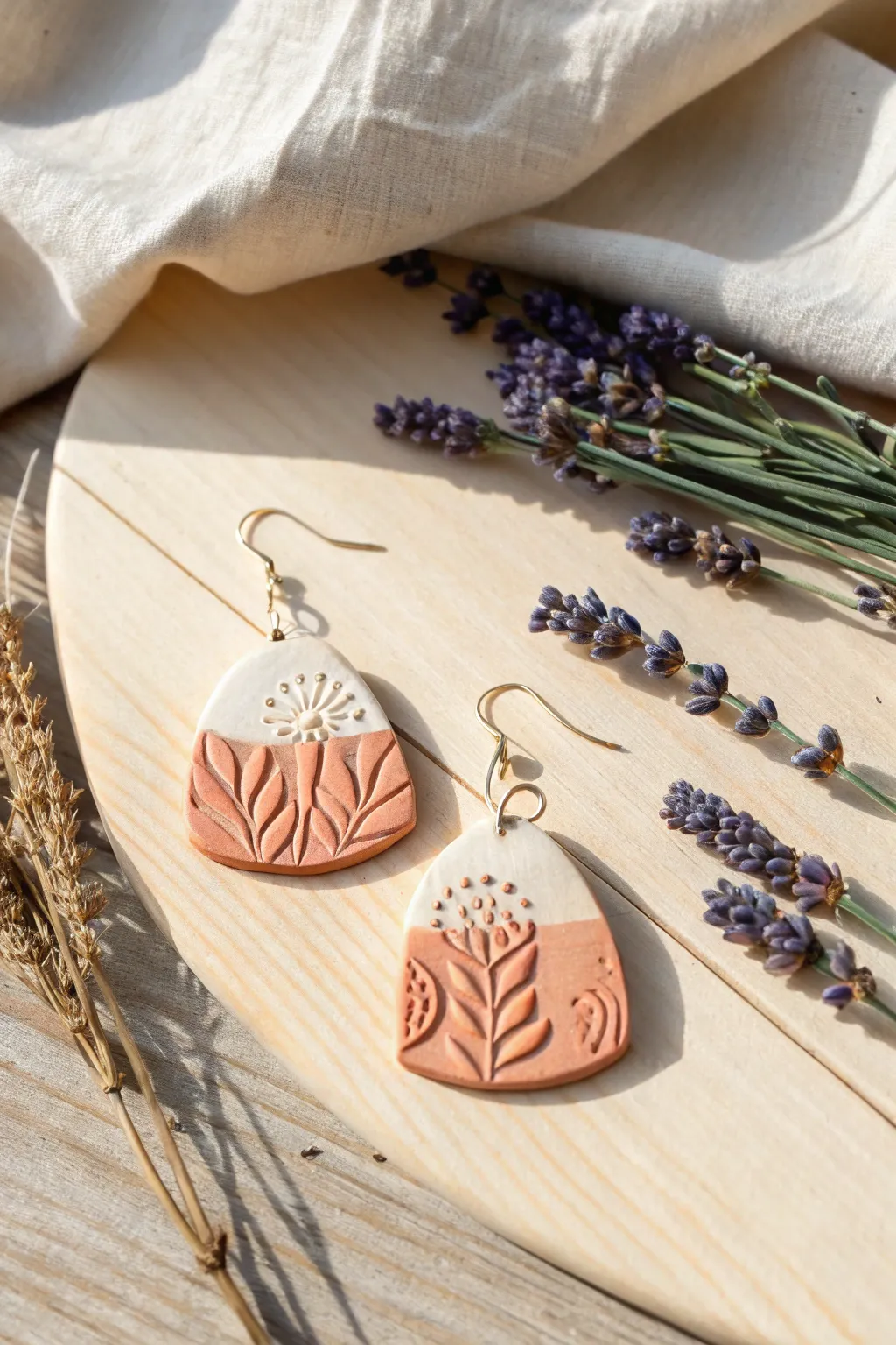 Handcrafted Elegance: Embrace the art of simplicity with these stunning clay earrings.