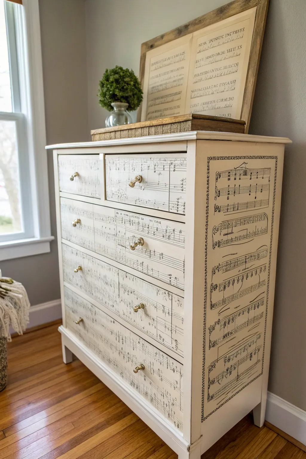 Transform your furniture into a melody of style with sheet music decoupage. 🎶✨ #ScandinavianBoho #Craftsmanship