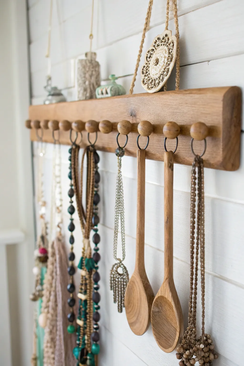 Transform vintage charm into modern elegance with this upcycled spoon rack jewelry holder. #ScandinavianStyle #BohoChic #DIYJewelryStorage