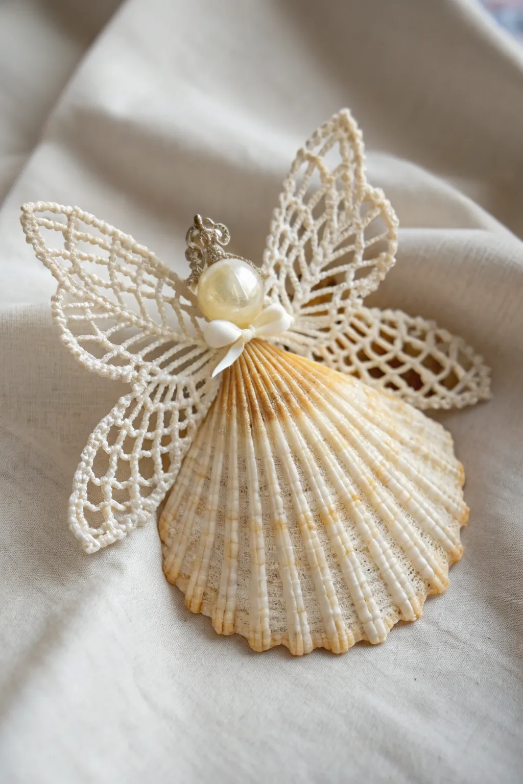Transform your holiday decor with the delicate charm of Lacy Shell Angels, where simplicity meets ethereal beauty.
