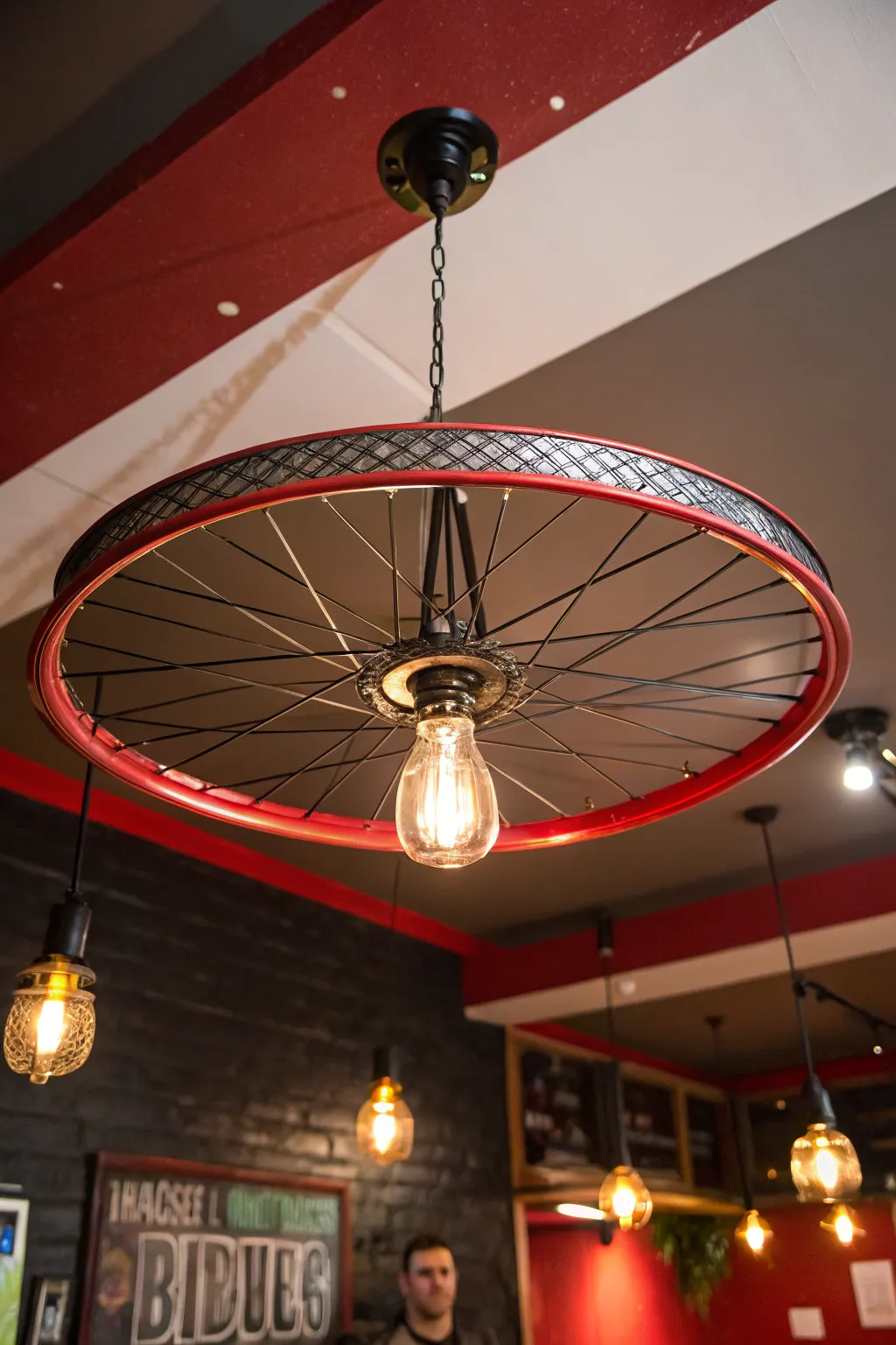 Illuminate your space with a touch of craftsmanship: a bicycle wheel transformed into a stunning light fixture.