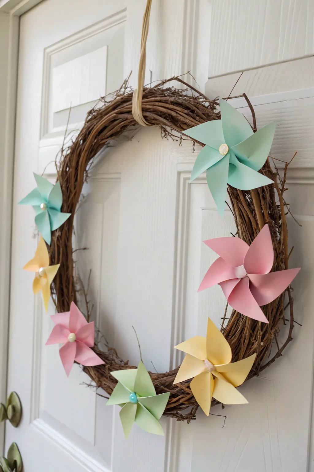 Welcome summer with a whimsical Pinwheel Party Wreath - your door's mini-festival!