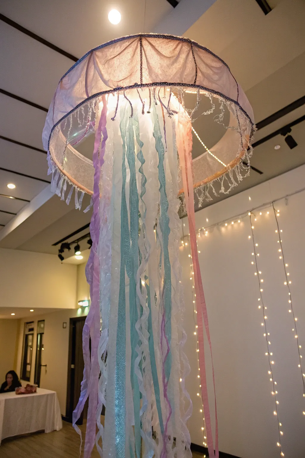 Illuminate your creativity with this ethereal jellyfish costume, where simplicity meets magical elegance.