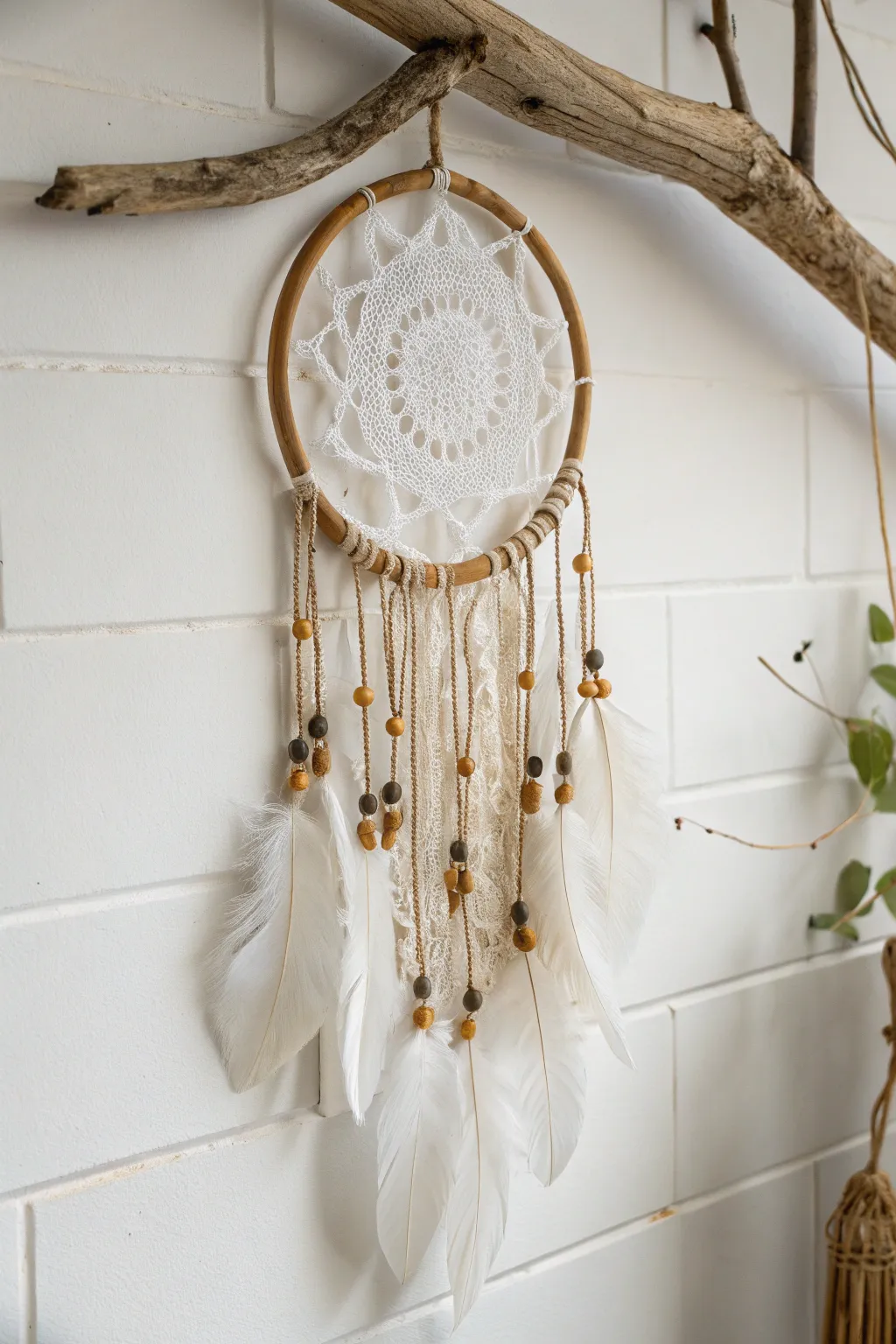 Bring woodland serenity into your home with this rustic branch dream catcher.