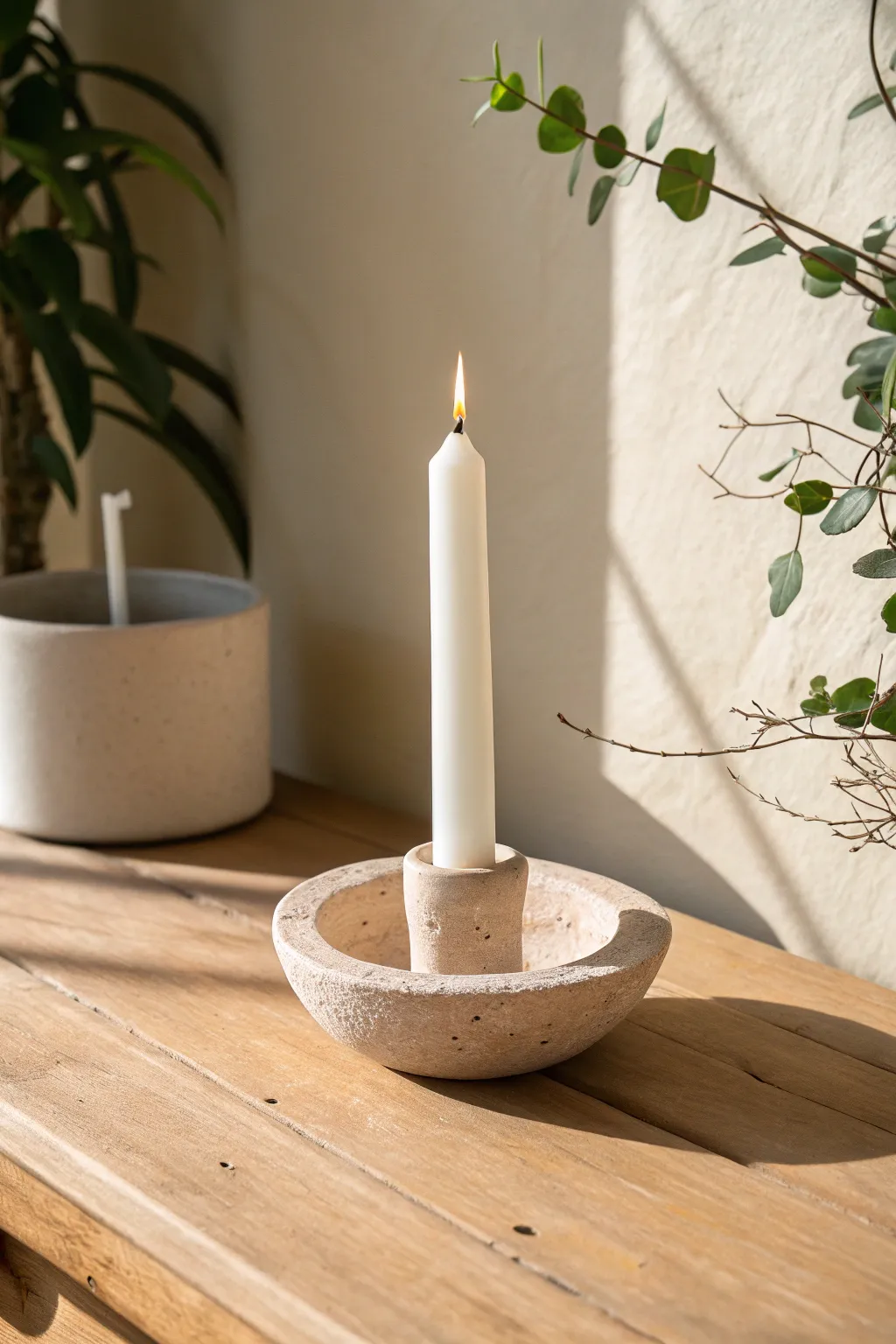 Embrace simplicity and warmth with this elegant clay candle holder, where minimalist design meets natural beauty.