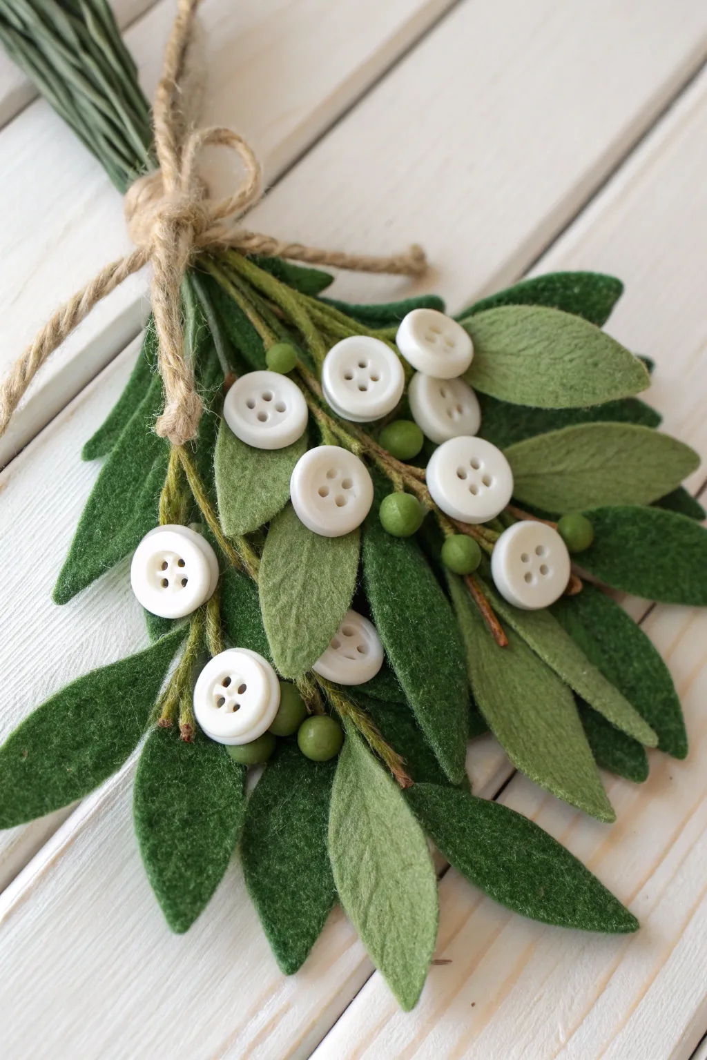 Elevate your holiday decor with this charming Button Berry Mistletoe, blending elegance and whimsy with a minimalist boho flair.