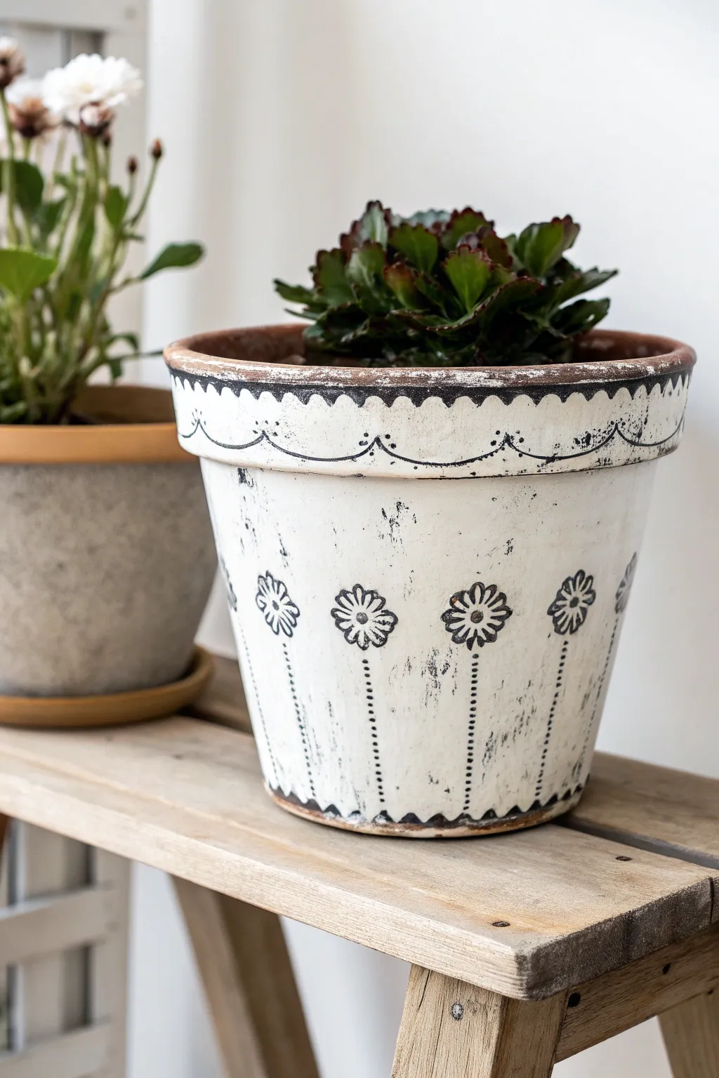 Transform your flower pots into vintage treasures with faux aging techniques.