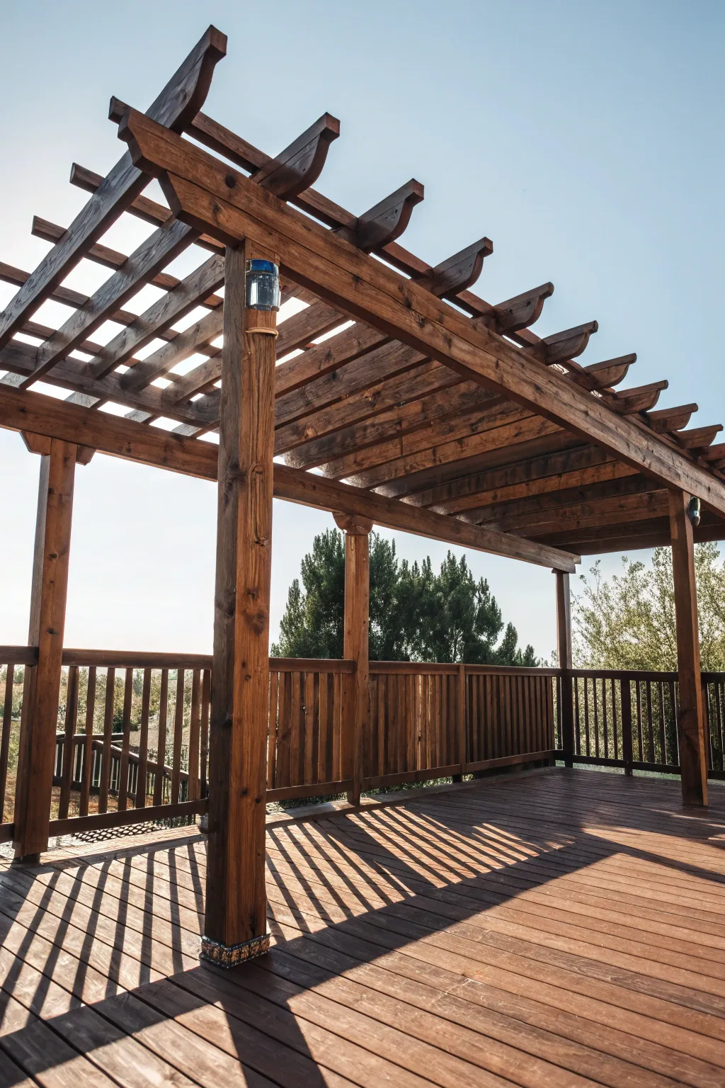 Elevate your outdoor space with the rustic charm of a pallet pergola. Unmatched in style and craftsmanship!