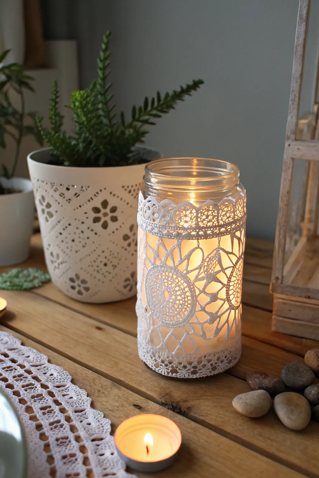 Illuminate your space with the serene glow of handcrafted doily luminaries, perfect for adding a touch of elegance and warmth to any evening.