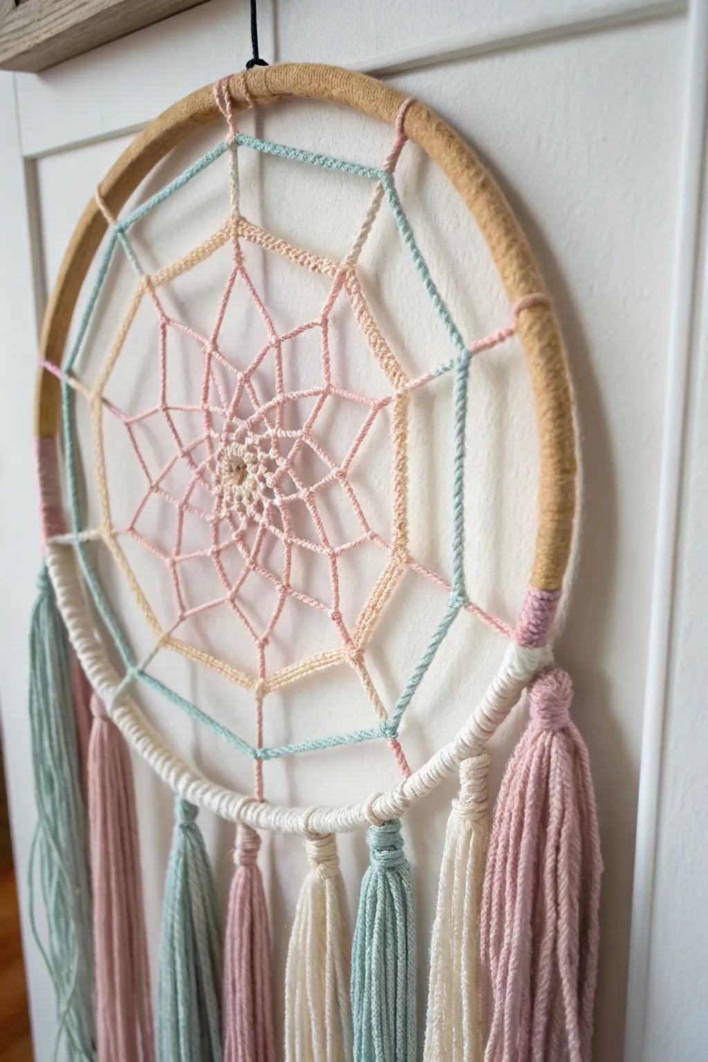 Enchant your space with the whimsical charm of handcrafted yarn spider webs.