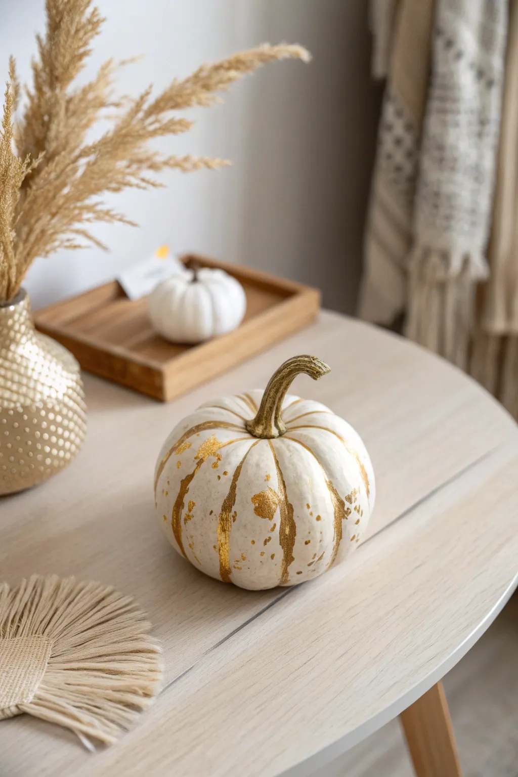 Elevate your fall decor with a touch of golden glam—perfect for a sophisticated Thanksgiving table.