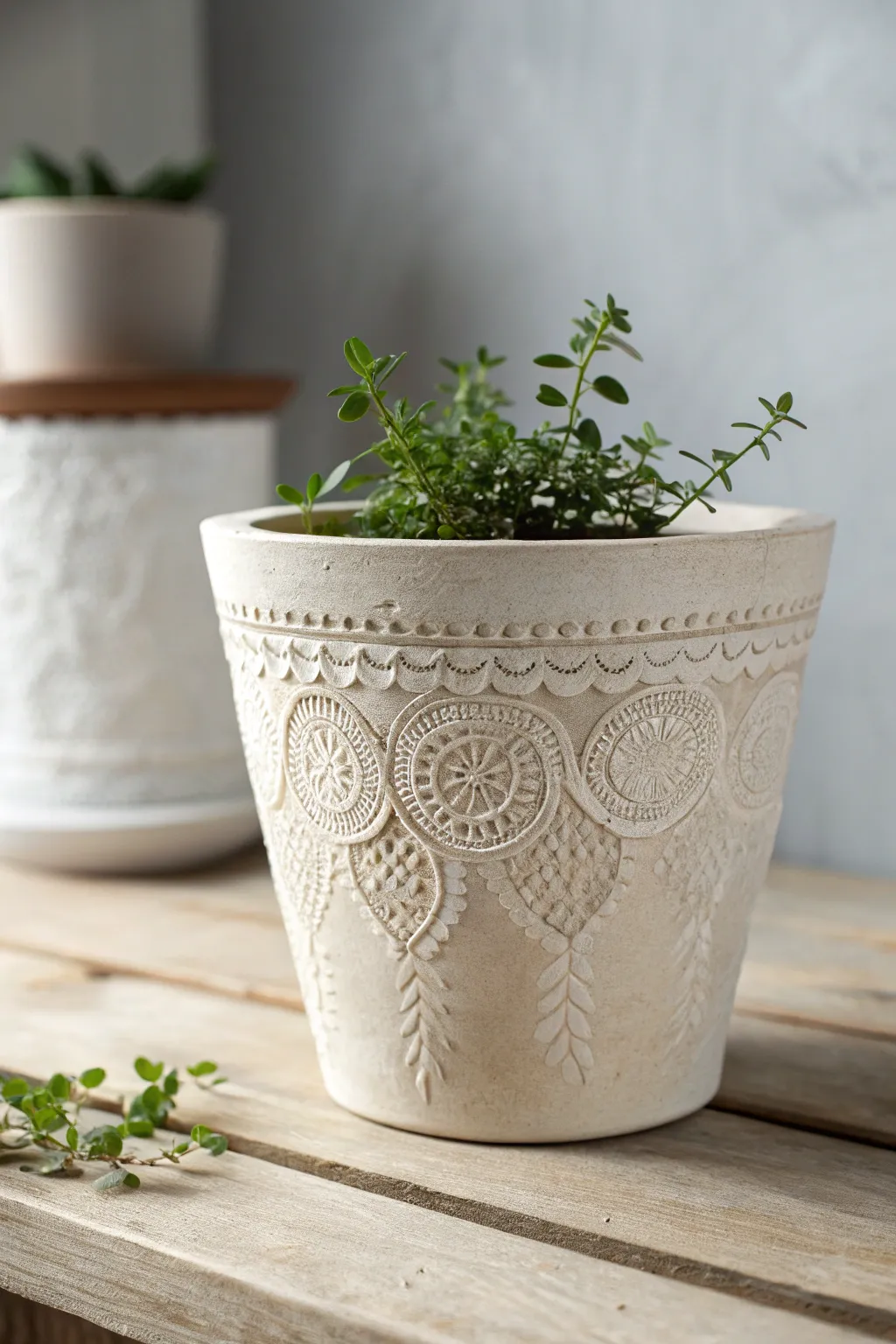 Discover the art of simplicity with lace-imprinted clay pots—where minimalist design meets bohemian charm.